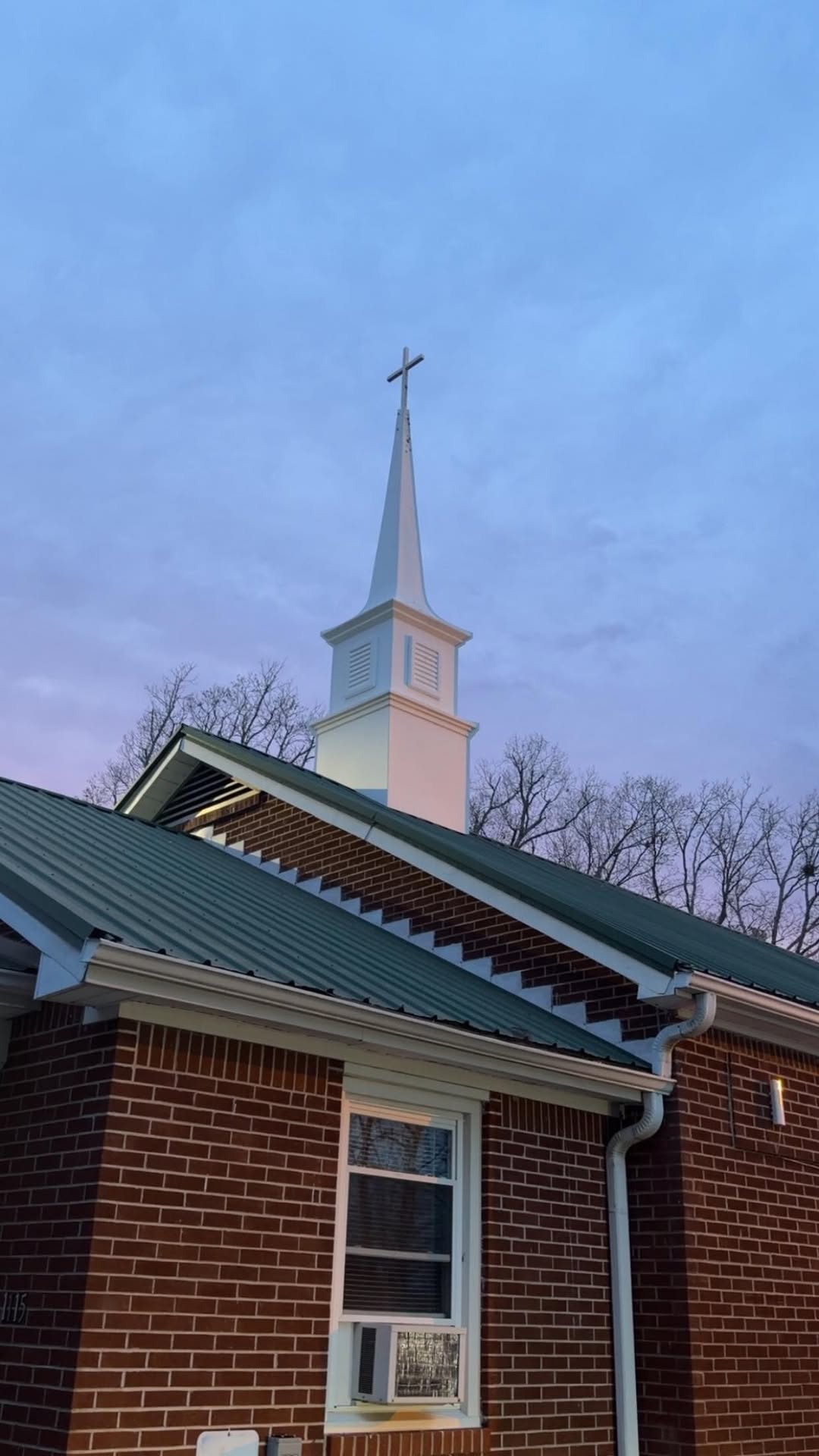 Bethel First Church of God building at dusk